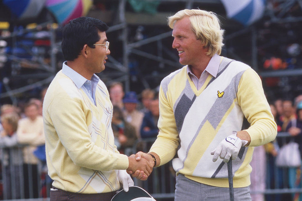 Tommy Nakajima shakes hands with Greg Norman at Turnberry